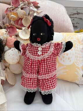 Baby doll in a red dress